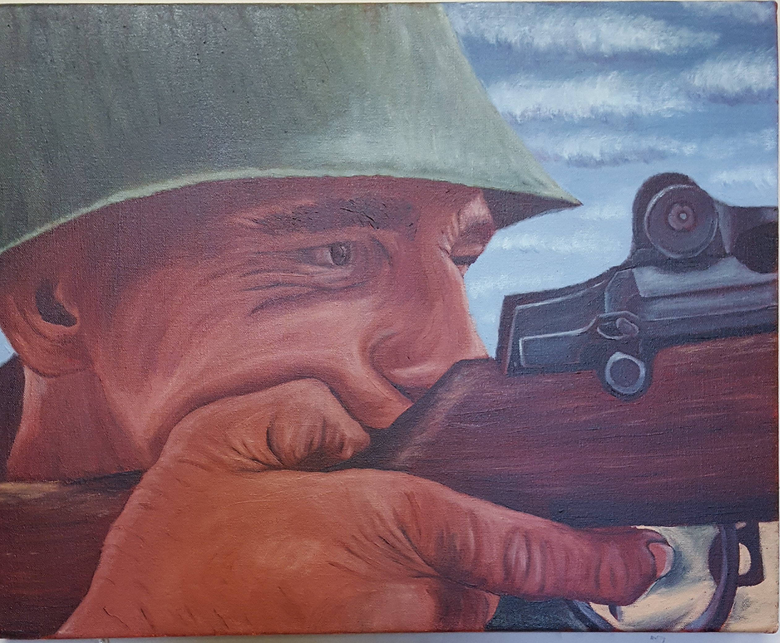 Young soldier shooting a gun